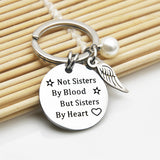 Not Sisters By Blood But Sisters By Heart Keychain